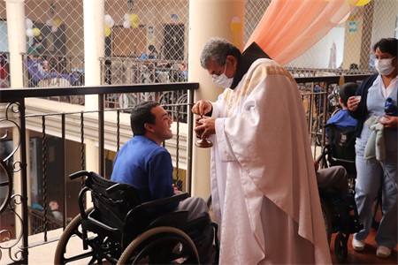 Taking Communion at Socorro